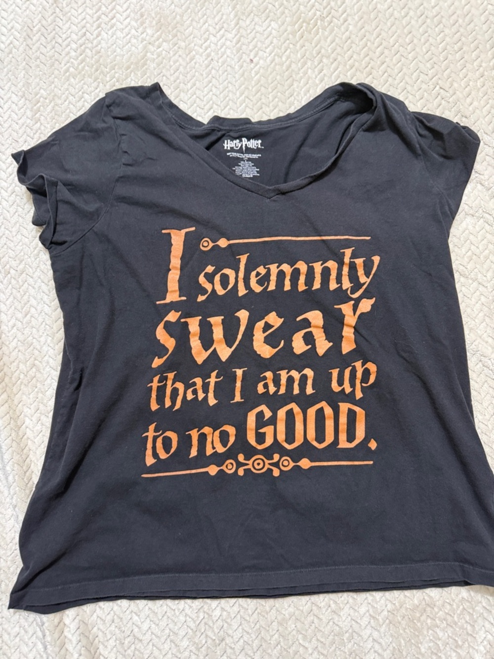 Warner Bros. Black Tee with Orange Harry Potter Quote